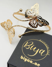 Waterproof 18K gold butterfly arm cuff Biya Accessoires UAE.
