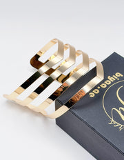 Hypoallergenic gold plated parallel band wide architectural cuff United Arab Emirates.