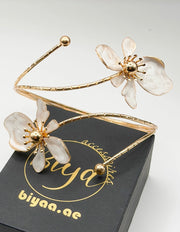 Non-tarnish botanical floral armlet for women Dubai luxury fashion.