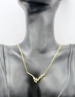 Hypoallergenic non-tarnish crystal floral side-cluster necklace.