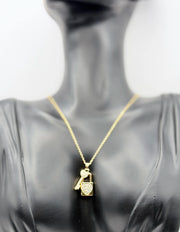 Waterproof gold lock and key romantic jewelry on white silk.