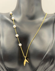 Modern luxury gold ocean inspired statement necklace gift.