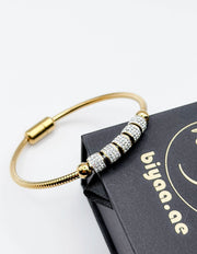 Waterproof gold magnetic clasp charm bracelet for women Dubai.