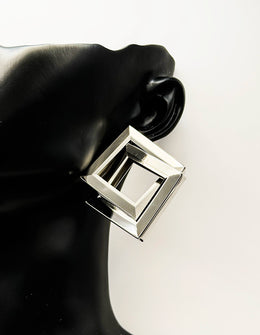 Biya Accessoires artificial jewellery online dubai interlocking geometric silver hoop earrings.