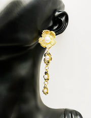 Best imitation jewellery brands in uae tiered floral gold and pearl dangles.