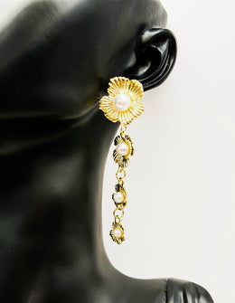 Best imitation jewellery brands in uae tiered floral gold and pearl dangles.