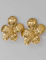 Close-up of handcrafted flower earrings Canada design


