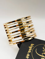 Hypoallergenic gold plated parallel band statement cuff United Arab Emirates.