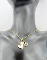 Hypoallergenic gold link chain necklace with two hearts for women.