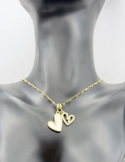Hypoallergenic gold link chain necklace with two hearts for women.