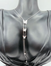 Waterproof non-tarnish silver butterfly Y-necklace resting in a luxury gift box for her