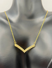 Modern luxury gold V necklace for women Dubai.