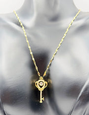 Modern luxury gold crown key statement necklace UAE.