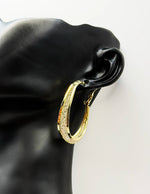 Multi-layered gold tone fashion earrings for everyday luxury in Dubai.