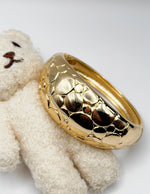 Non-tarnish embossed dome cuff for women Dubai luxury fashion.