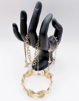 Non-tarnish gold statement bracelet set with clover charms for women Dubai.
