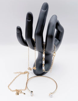 Hypoallergenic gold plated pearl and baguette crystal cuff United Arab Emirates.