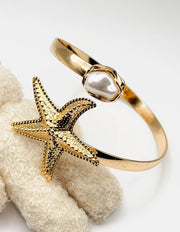 Luxury tarnish-free stainless steel pearl arm bangle for sensitive skin.