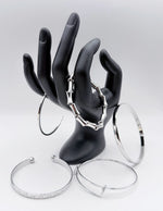Waterproof silver architectural bangle stack Biya Accessoires UAE.