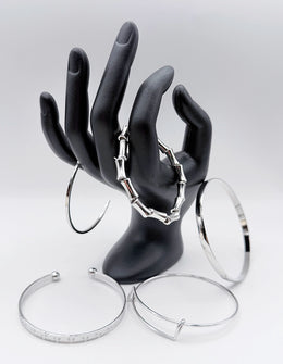 Waterproof silver architectural bangle stack Biya Accessoires UAE.