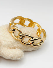 Non-tarnish thick gold statement cuff for women Dubai luxury fashion.