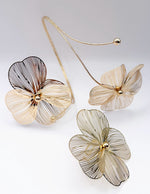 Non-tarnish wire flower statement jewelry Dubai luxury fashion.