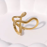 Modern luxury fine art editorial gold jewelry continuous loop ring gift for her.