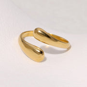 Modern luxury fine art editorial gold jewelry fluid metal ring gift for her.