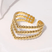 Modern luxury fine art gold editorial jewelry triple stack ring gift for her.