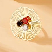 Modern luxury gold red black and clear crystal statement ring.
