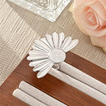 Modern luxury bold brushed silver daisy ring for women.