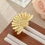 Modern luxury bold brushed gold daisy ring for women.