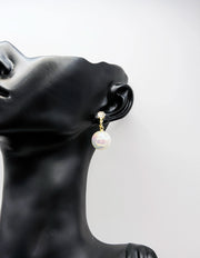 Biya Accessoires gold iridescent aura pearl and crystal drop earrings.