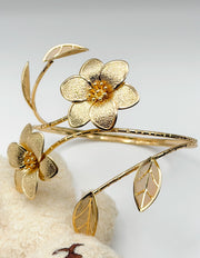 Non-tarnish 3D botanical wrap armlet for women Dubai luxury fashion.