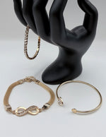 Hypoallergenic gold plated stackable jewelry set architectural minimalist design.