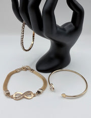 Hypoallergenic gold plated stackable jewelry set architectural minimalist design.
