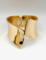 Hypoallergenic gold plated avant-garde hinge bracelet United Arab Emirates.