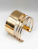 Non-tarnish bold gold architectural bracelet set for women Dubai luxury fashion.