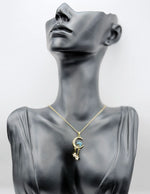 18K gold plated crescent moon and blue galaxy stone pendant by Biya Accessoires.
