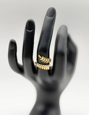 Hypoallergenic non-tarnish high polish botanical gold wrap ring UAE.