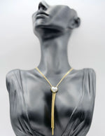 Waterproof gold Y-necklace with pearl pendant and snake chain fringe.