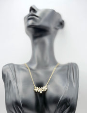 18K gold plated horizontal floral crystal cluster necklace.