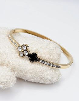18K gold plated black onyx and crystal clover bypass bangle by Biya Accessoires gift for her