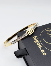 Waterproof gold geometric channel set square crystal bracelet for women Dubai.