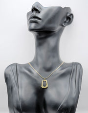 Waterproof gold hollow rectangle necklace on snake chain by Biya Accessoires.