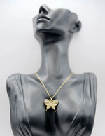 Waterproof non-tarnish artificial gold jewelry featuring a gothic cross pendant in Dubai.