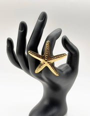 18K gold plated textured starfish statement ring by Biya Accessoires.