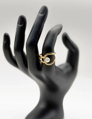 Modern luxury gold boho-chic sculptural jewelry turquoise ring.