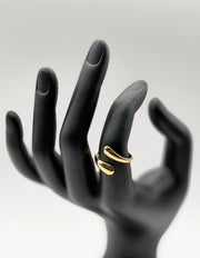 Hypoallergenic non-tarnish high polish architectural droplet ring UAE.