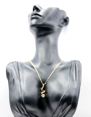 18K gold plated spiral solitaire pendant necklace by Biya Accessoires.